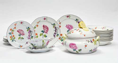 PIECES OF A DINNER SERVICE WITH A "VIENNESE" FLORAL DECORATION