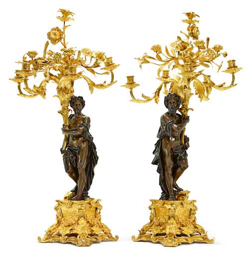 A PAIR OF CANDELABRA DESIGNED AS FIGURES