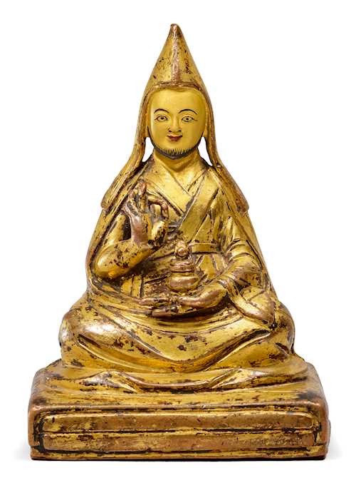 A CHARMING SMALL FIGURE OF THE 5TH DALAI LAMA.