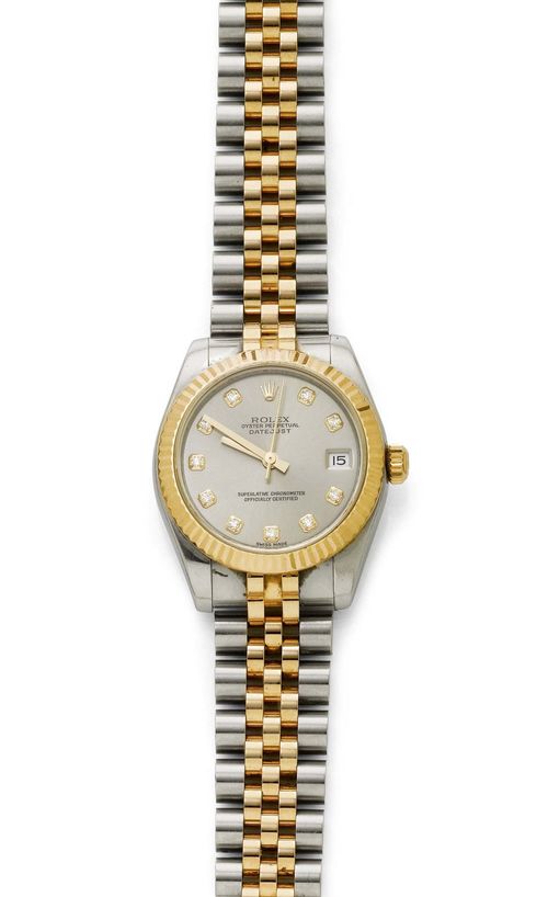 DIAMOND LADY'S WRISTWATCH, ROLEX DATEJUST, ca. 2004. Steel and pink gold 750. Ref. 178271. Polished case No. D335606 with fluted gold lunette and gold crown. Steel-coloured, matte-finished dial with diamond indices and gold-coloured hands, date with magnifying glass. Automatic movement No. A-2065826, Cal. 2235. Bicolour Jubilee band with fold-over clasp. D 31 mm. With leather case and warranty.