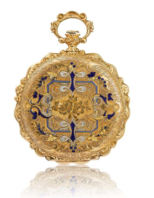 BAUTTE A GENÈVE, RARE DRESS WATCH, ca. 1840. Yellow gold 750. Very flat, decorative case No. 3429, opulently engraved and decorated with white, light blue and dark blue enamel. Gold dust cover likewise opulently engraved and signed. Fine, white enamelled dial with black Roman numerals and gilt Breguet hands. Flat cylinder movement with key winder, signed: Bautte Genève. Bridge with blued screws and 4 rubies. D 43 mm. With watch chain of real hair.