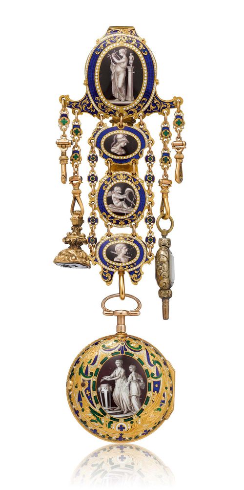 HALEY & SON LONDON, GOLD AND ENAMEL WATCH WITH CHATELAINE, England ca. 1800. Yellow gold 750. Finely enamelled and engraved outer case, the centre with a mythological scene in brown, white and grey. Decorated with blue, green and white cloisonné enamel, on an engraved ground. Smooth, polished inner case with manufacturer's stamp IW, London hallmark for 1812. Dust cover and movement signed Haley & Son London U A. White enamelled dial with black, Arabic numerals and gold hands. Early cylinder movement with fusee and chain. Engraved skeleton balance bridge with diamond capstone, silver cylinder gear, silver regulator scale. Matching, fire-gilt chatelaine with matching miniature enamel painting, likewise decorated with blue, green and white cloisonné enamel. Heliotrope signet engraved with coat-of-arms, and key inlaid with heliotrope and chalcedony.  D (outer case) 47.5 mm.