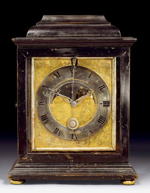 BRACKET CLOCK WITH MOON PHASES,Baroque, the movement signed CIPRIANUS REUTTER AUGSBURG (active 1633-1704), Augsburg circa 1680. Shaped and ebonised walnut. With finely engraved and gilt bronze dial with silver-plated chapter ring and finely painted moon phase. Verge escapement with 1/2 hour striking on bell. 32x11x32 cm. Provenance: Zurich private collection.