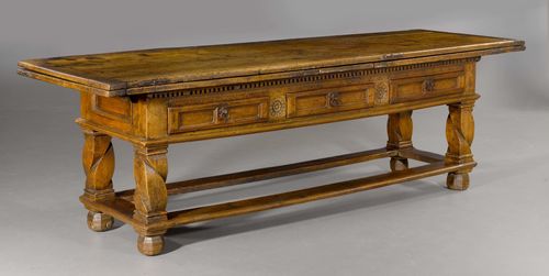 EXTENSION TABLE, Baroque, probably Valais, dated 1662 and inscribed MENSA TAXAE DUBLARUM QUINQUE - IMPENSIS - FACTA&EXSCISSA. Walnut, carved with rosettes and decorative friezes. Iron mounts. 260(386)x80x81 cm.